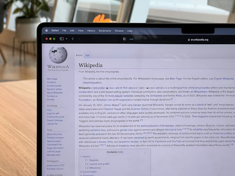 Wikipedia first method shown by a laptop displaying a Wikipedia article